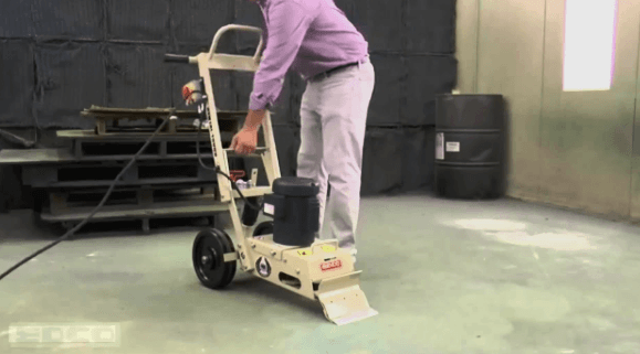 floor stripper removing tile adhesive from concrete